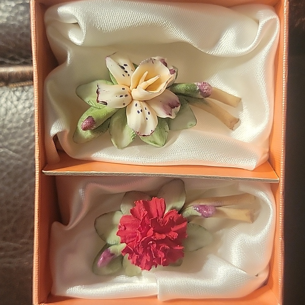 Vintage Capodimonte porcelain floral brooches. Never worn. In box with COA